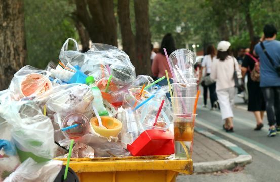 Plastics piled up in a bin